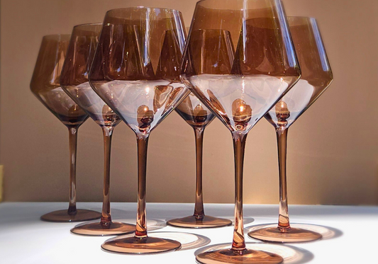 Colored glassware in a warm, chocolate tone. 