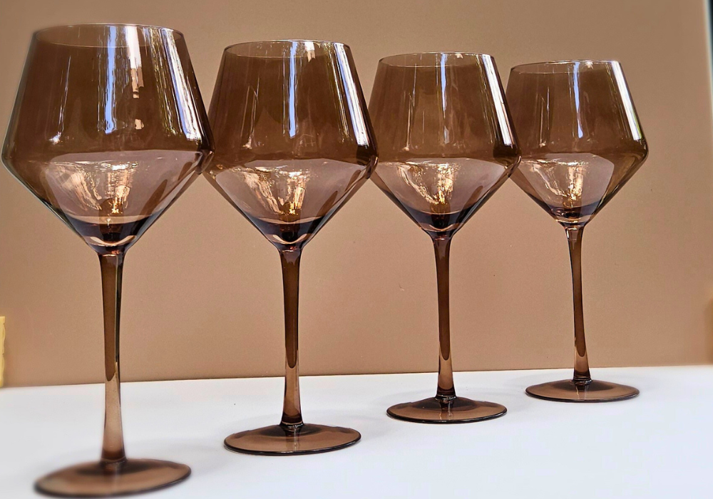 Colored glassware in a warm, chocolate tone. 