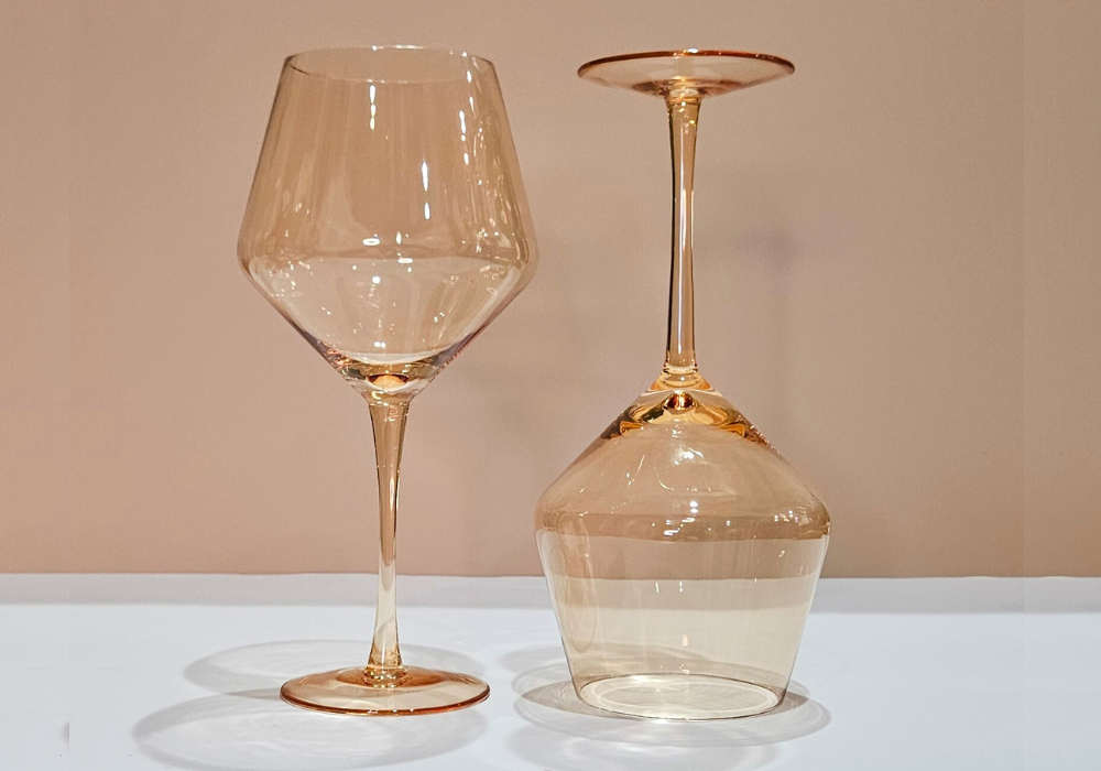 Bold gold wine glass with elegant design, representing individuality