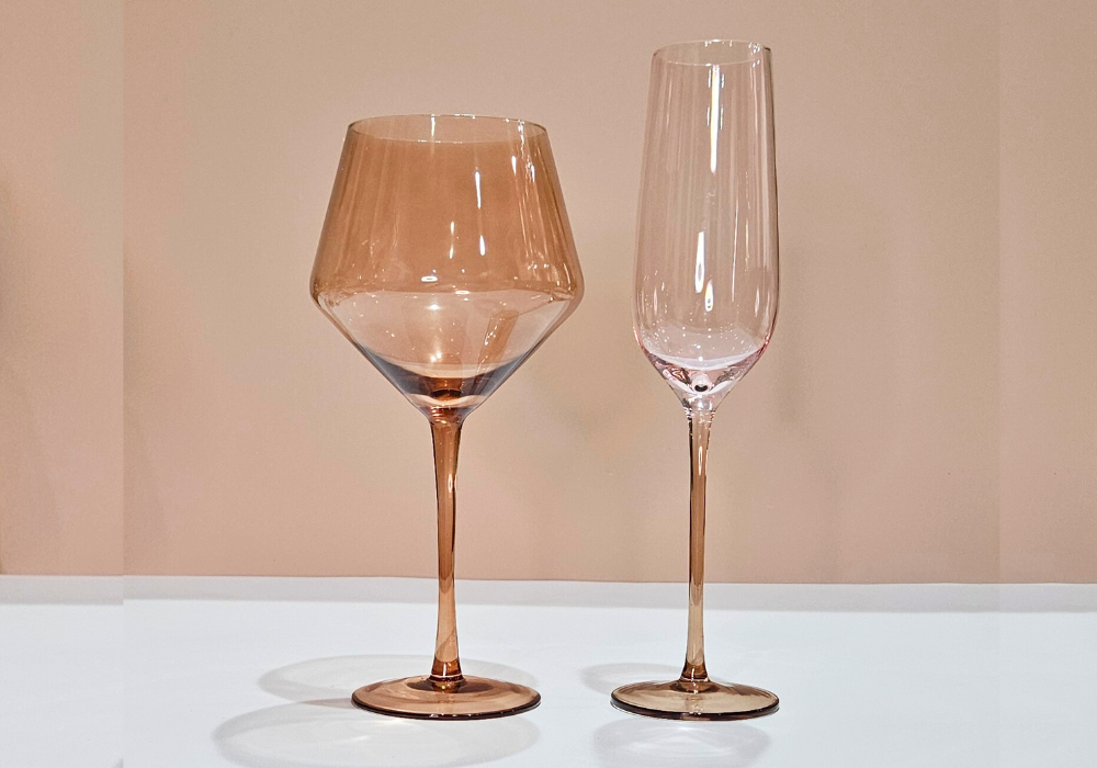 Warm-toned wine glass with soft curves, designed for vibrant gatherings